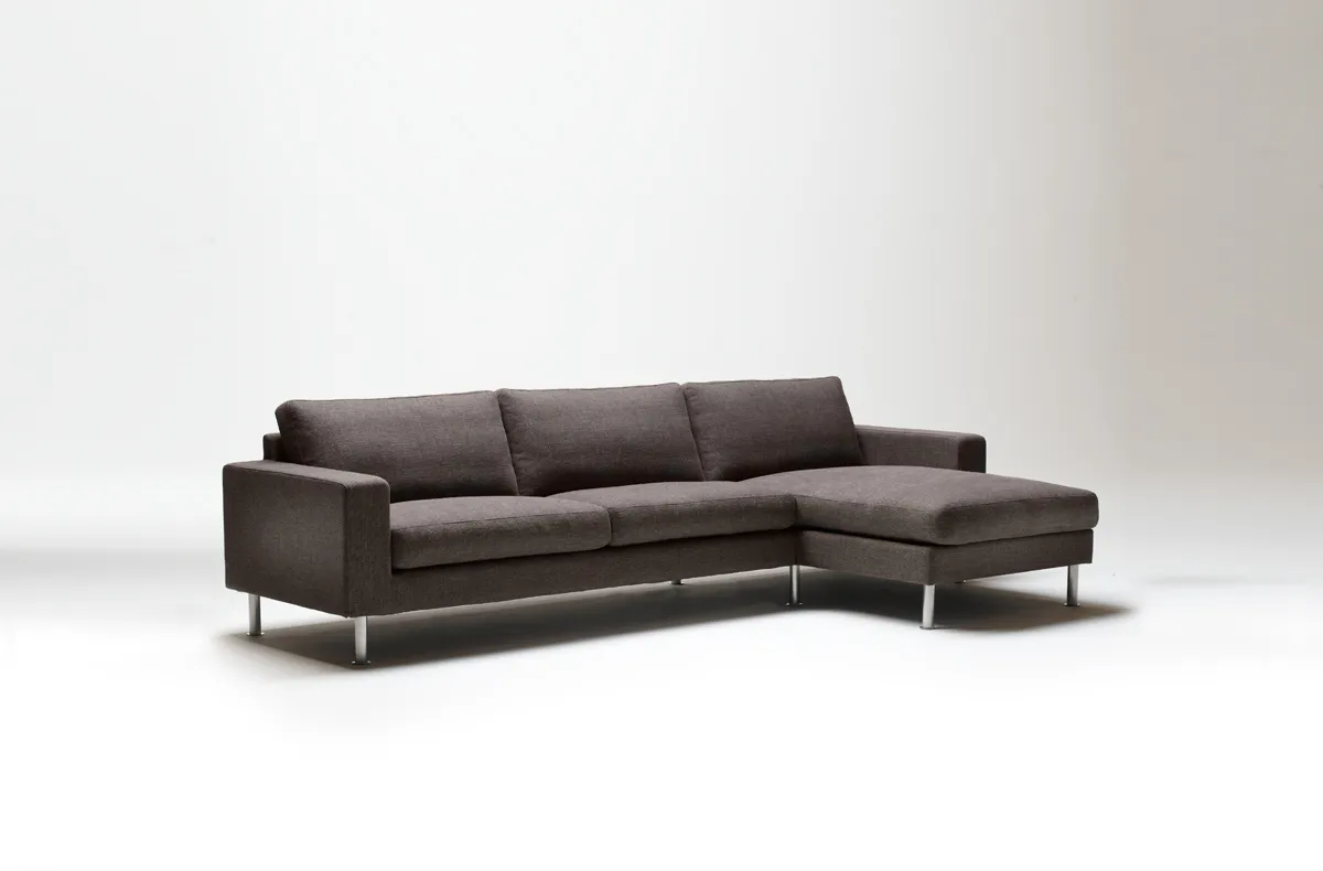 Dark sofa with a chaise section Dark sofa with a chaise section