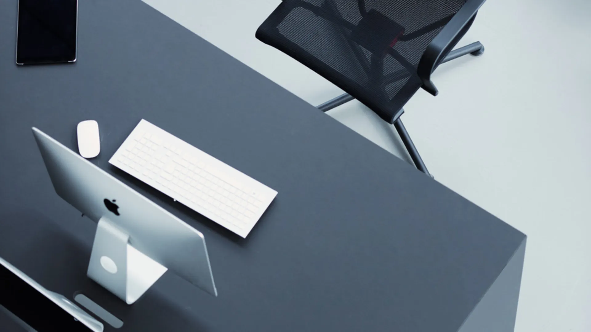 Black office chairs at a desk Black office chairs at a desk