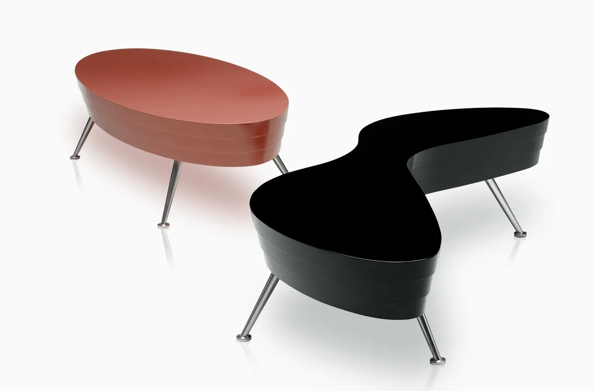 Three low tables with differently coloured tops Three low tables with differently coloured tops